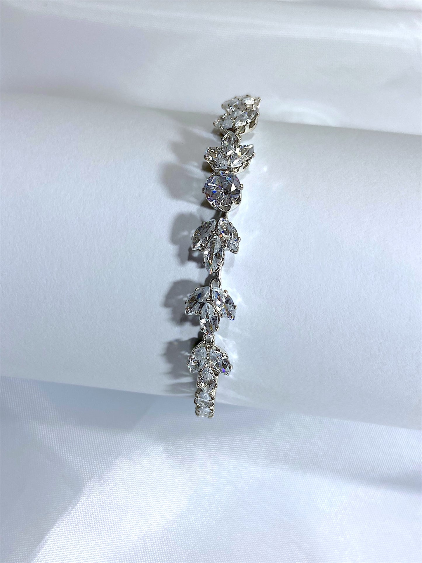 Sparkling Vine-Inspired Silver Bracelet with Crystal Accents