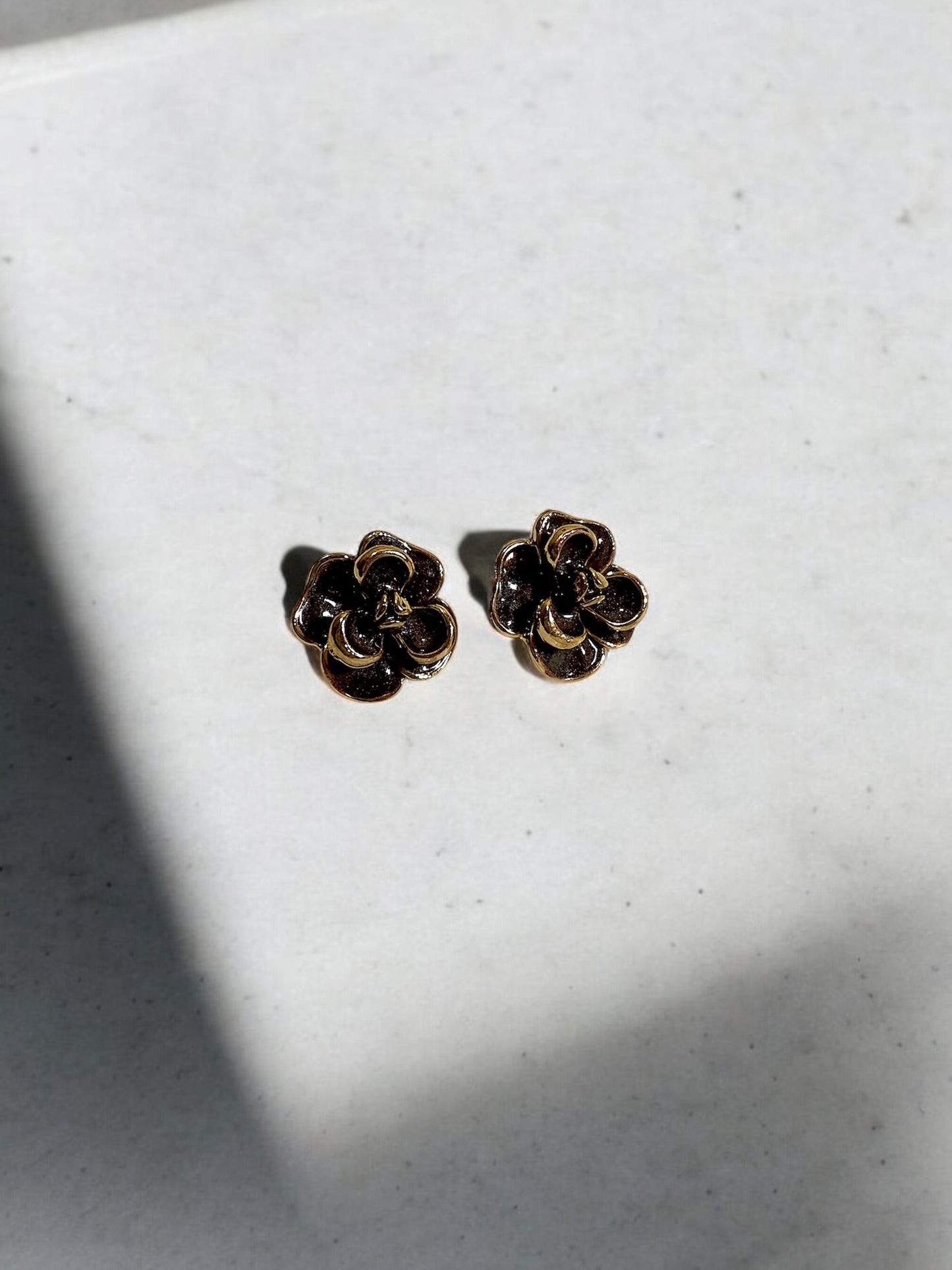 Classic Black Flower Stud Earrings with Gold Accents