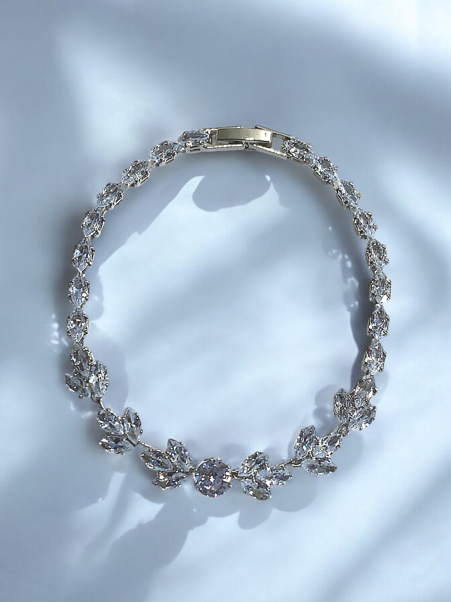 Sparkling Vine-Inspired Silver Bracelet with Crystal Accents